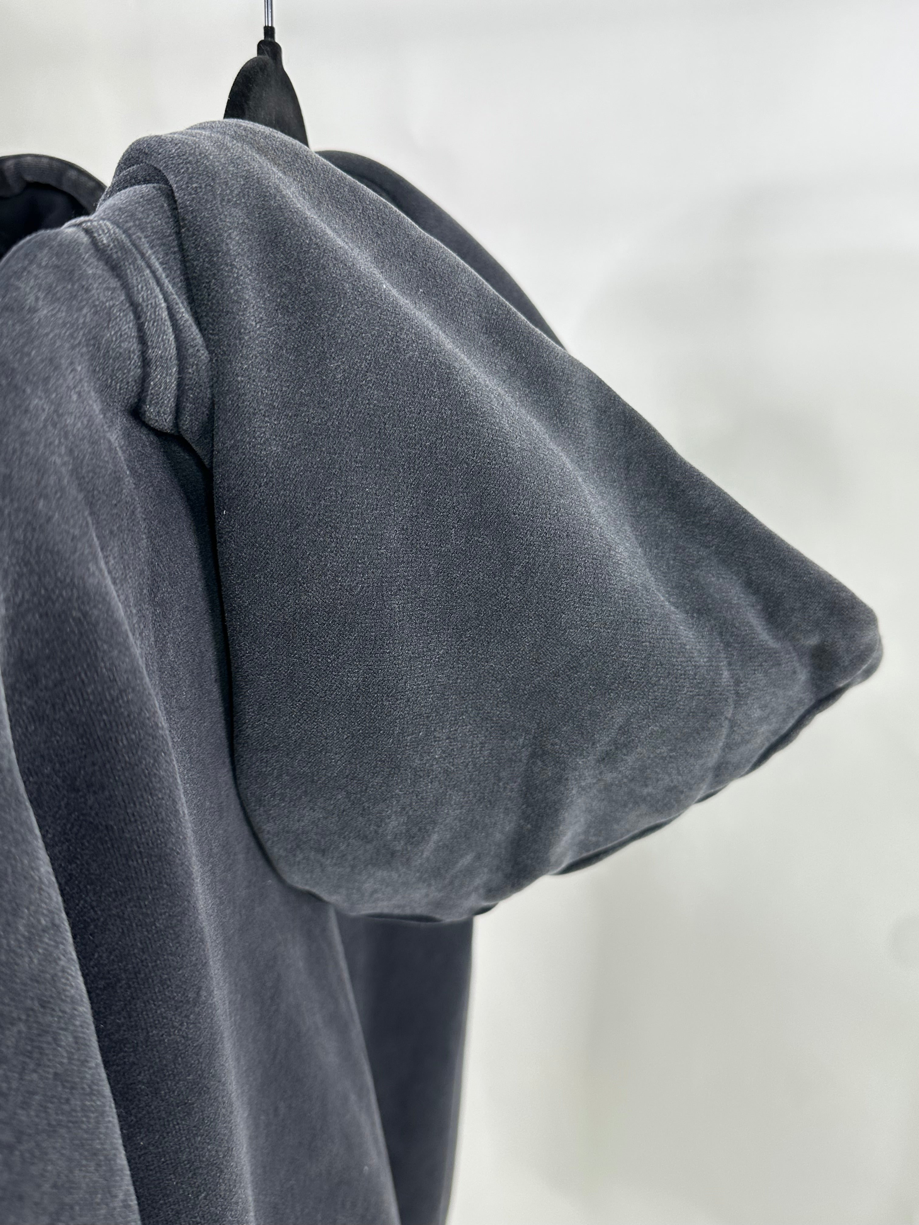 The Go-To Zip Hoodie – relaxed fit with an effortless drape – ultra-soft fleece for warmth without bulk – worn-in washed black tone – ribbed cuffs and hem for added structure – a must-have layering piece-acid wash hoodie- black hoodie